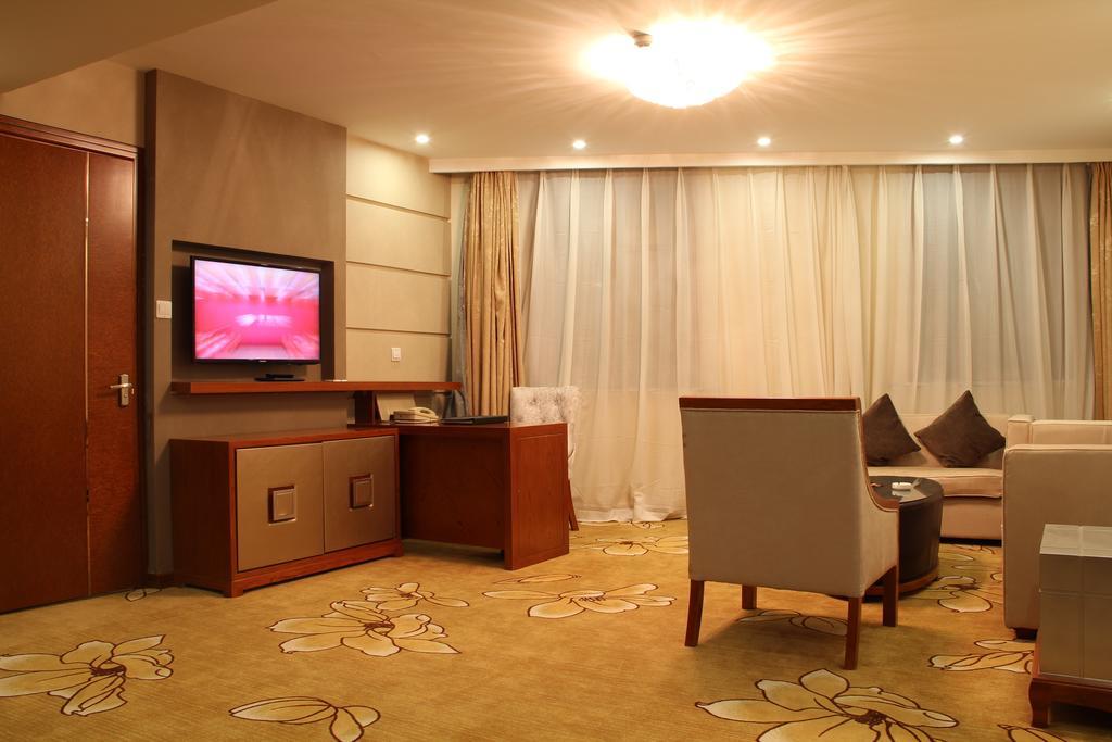 Harbin Victories Hotel Habitación foto