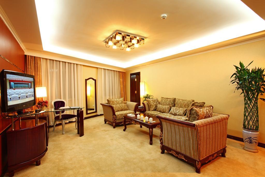 Harbin Victories Hotel Habitación foto